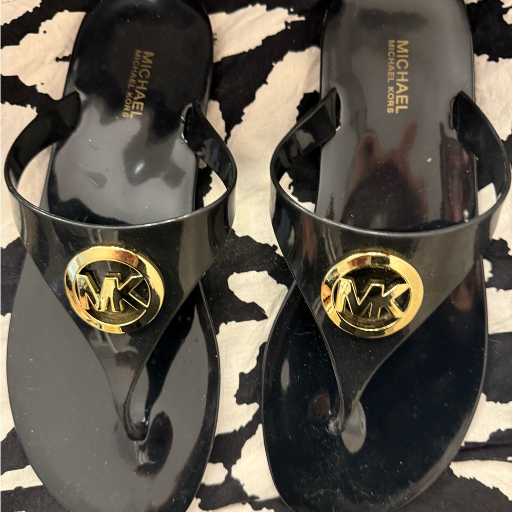 Michael Kors Black Jelly Lillie Flip Flops with Gold Emblem sz 8